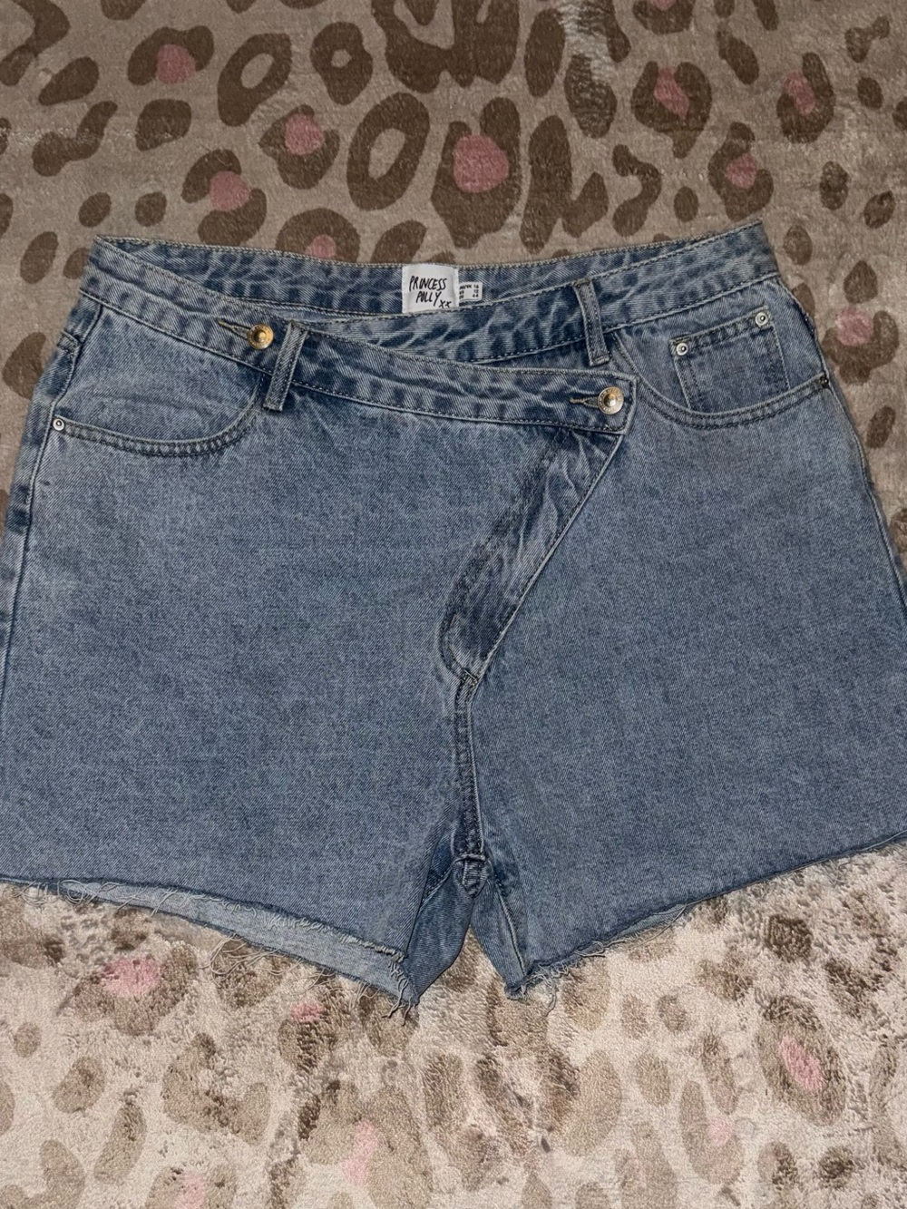 Princess Polly Cropped Asymmetrical Button High-Rise Denim Shorts - Blue Wash